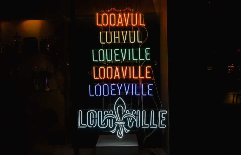 A sign outside of the Louisville visitor's center Louisville looavul luhvul looeyville 
